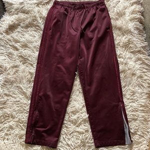 Men’s burgundy TekGear track pants size M
